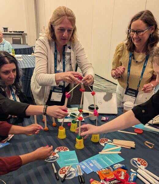 Workshop participants working together at a table