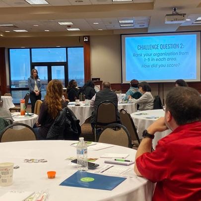 Teresa Huff working the room at a Get the Grant workshop